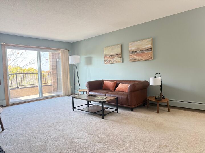 Property Photo:  2200 Midland Grove Road 305  MN 55113 