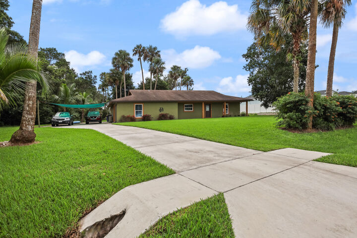 Property Photo:  15440 SW Palm Drive  FL 34956 
