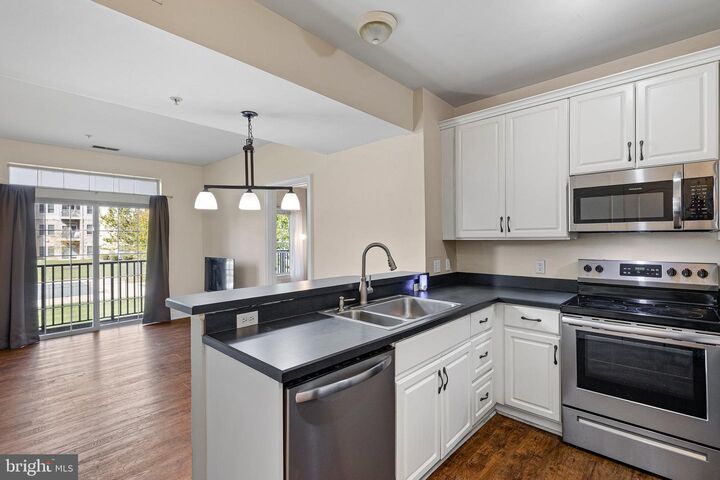 Property Photo:  1000 Fountainview Circle 1206  DE 19713 