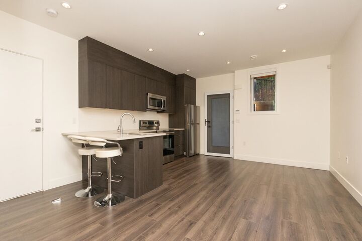 Property Photo:  7230 Kitchener Street Suite  BC V5A 1L6 