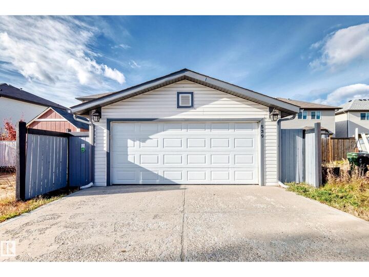 Property Photo:  539 Songhurst Wy  AB T9E 4G8 