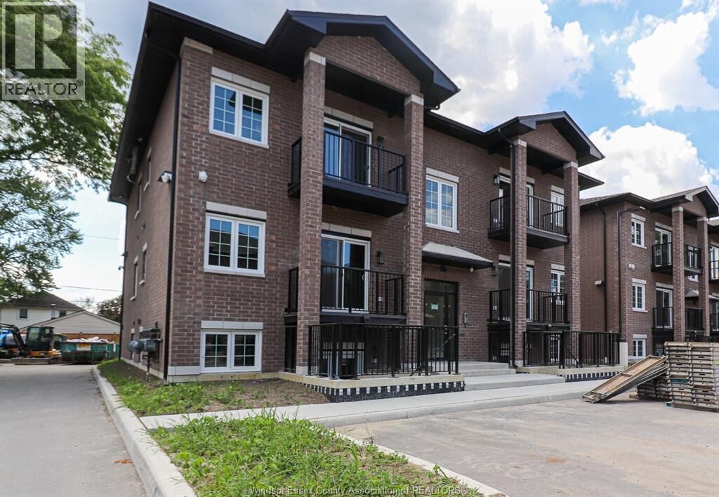Property Photo:  233 Watson 103  ON N8S 3R8 