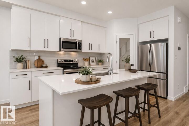 Property Photo:  308 Devonshire  AB T8B 0G9 
