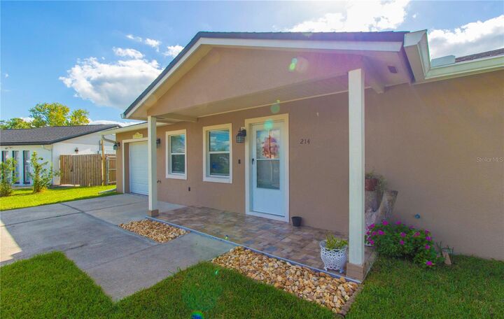 Property Photo:  214 Dahlia Drive  FL 34743 