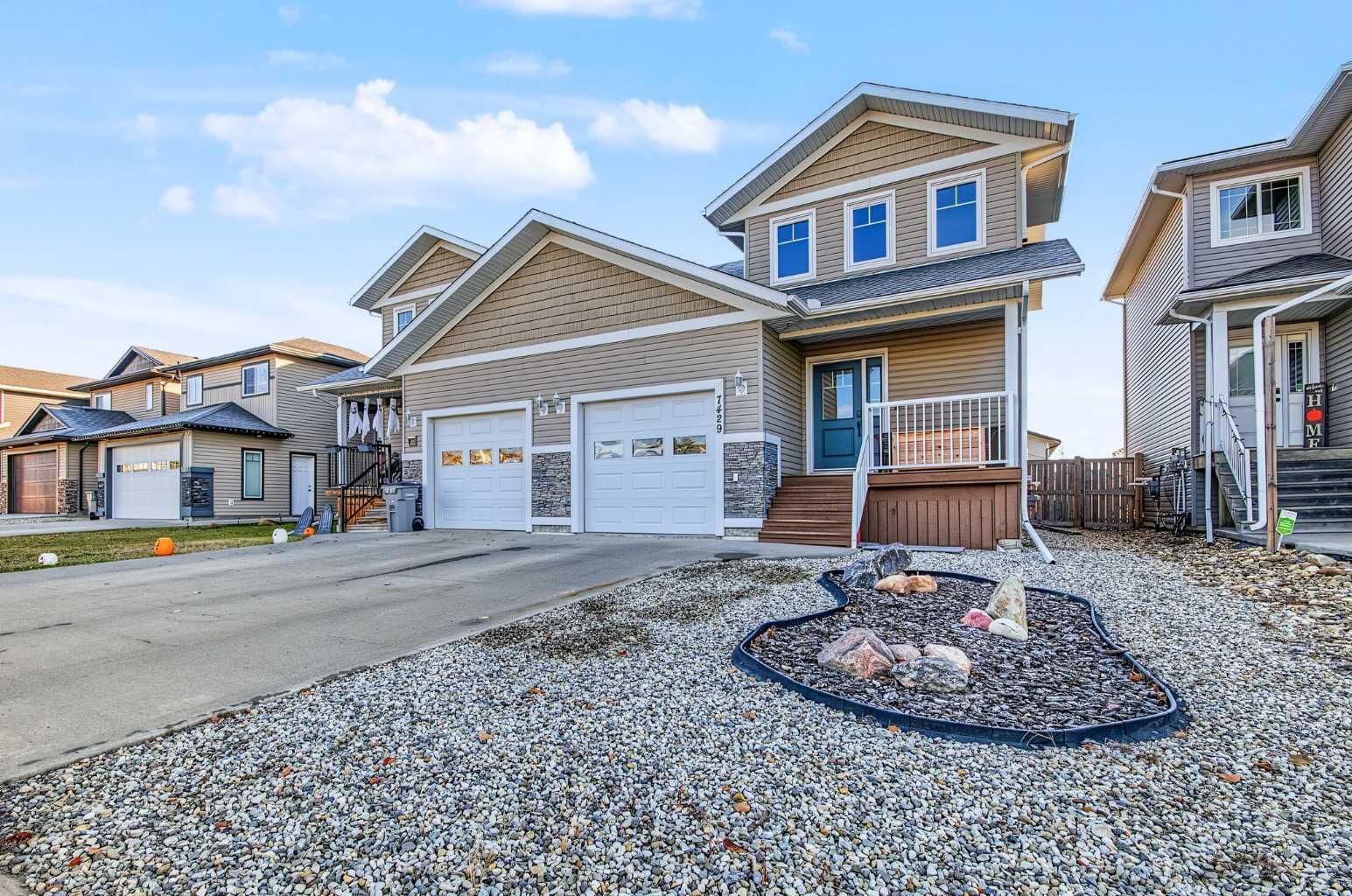 Property Photo: 7429 90A Street AB T8X 0H9