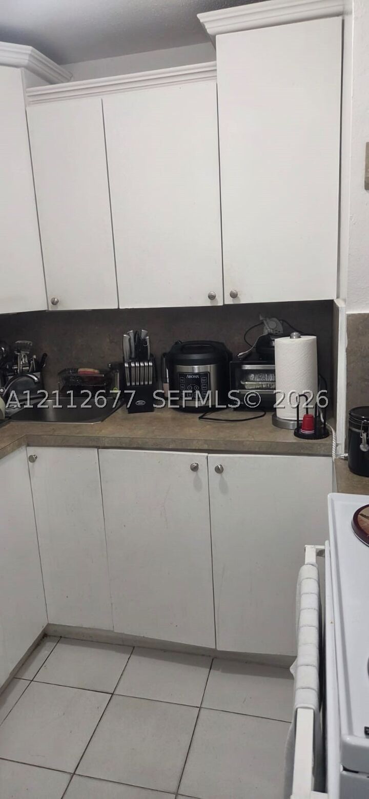 Property Photo:  6675 W 4th Ave 206  FL 33012 