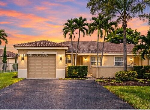 Property Photo:  1867 Andromeda Ln  FL 33327 