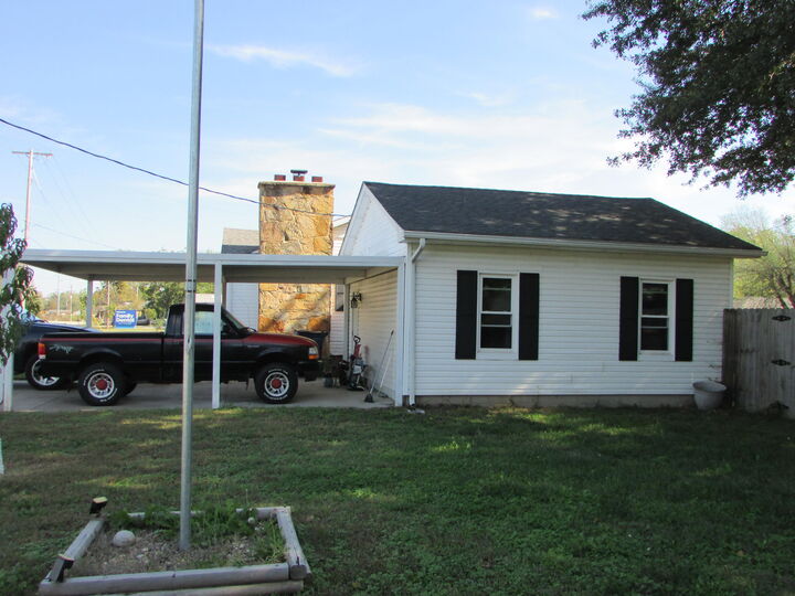 Property Photo:  1516 Frisco Street  MO 64865 