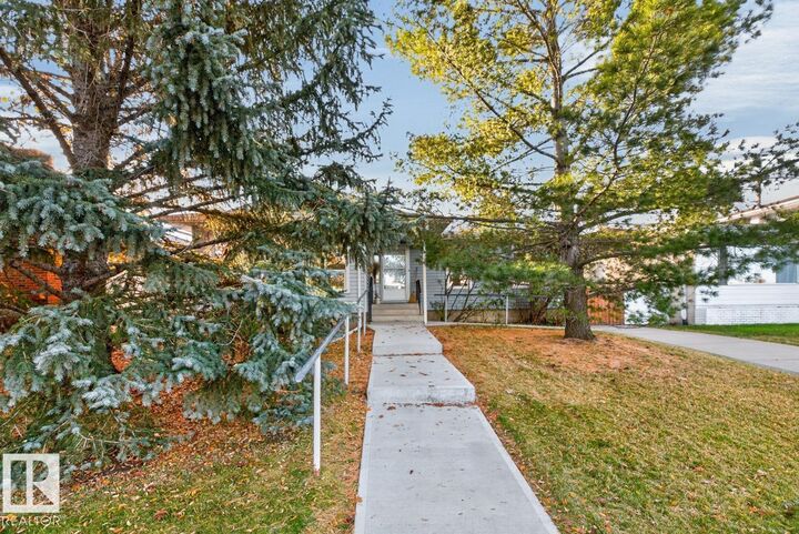 Property Photo:  8711 38A Avenue NW  AB T6K 0E7 