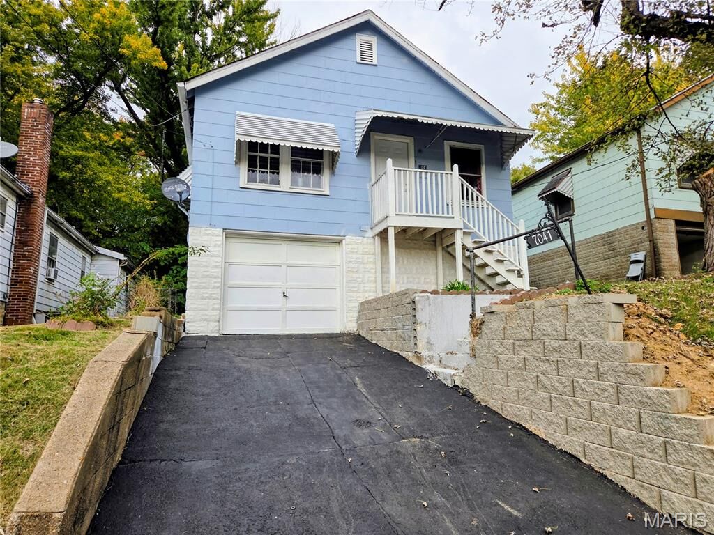 Property Photo:  7041 Garesche Avenue  MO 63136 