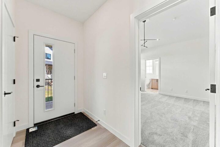 Property Photo:  201 Cooperswood Green SW 604  AB T4B 5R2 