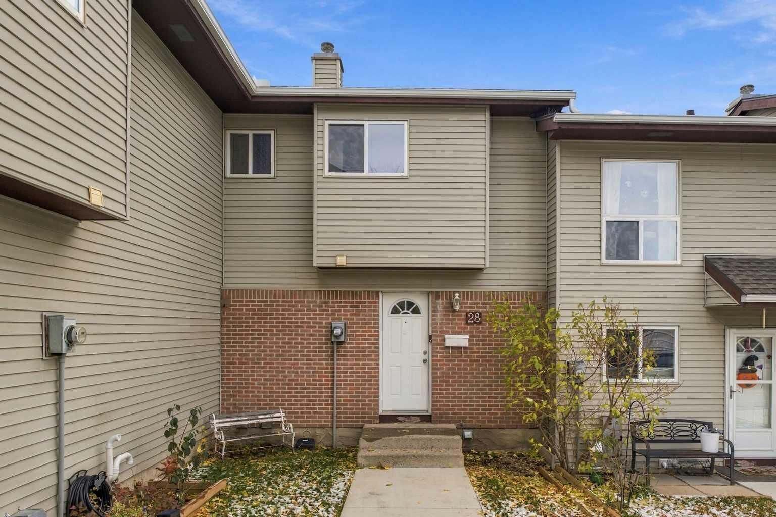 Property Photo:  64 Whitnel Court NE 28  AB T1Y 5E3 