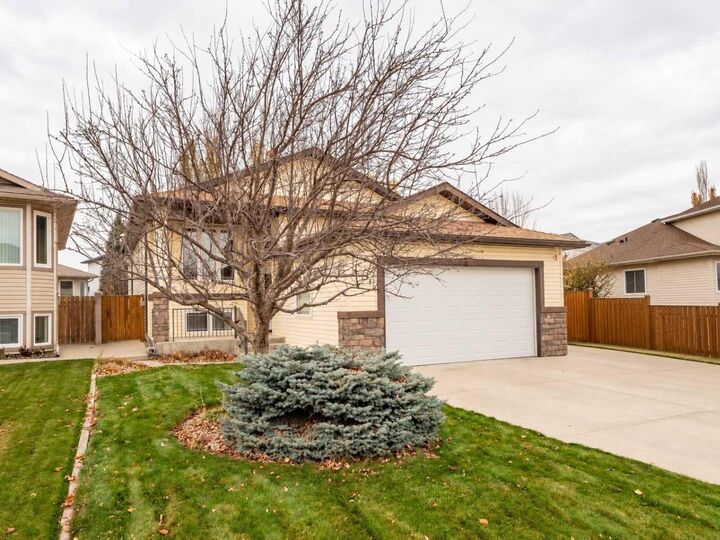 Property Photo:  417 Grizzly Crescent N  AB T1H 5N3 