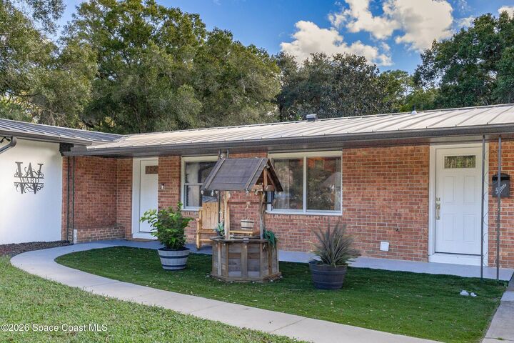 Property Photo:  6597 Norman Drive  FL 32904 
