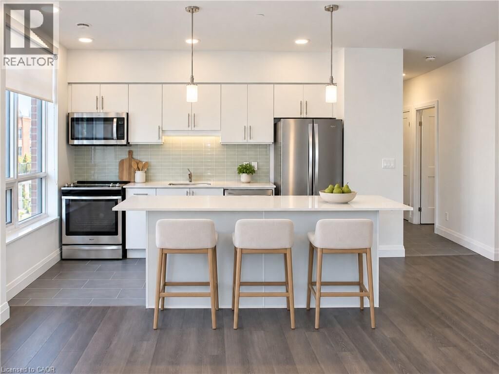 Property Photo:  399 Queen Street South 212  ON N2M 1A3 