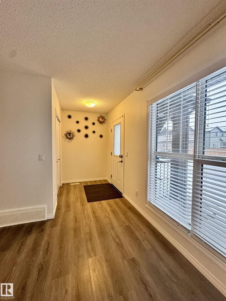 Property Photo: 1309 Darby Way SW AB T6W 4N3