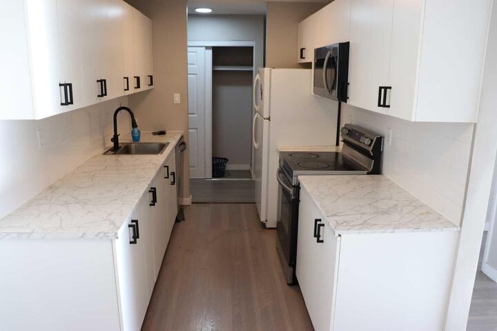 Property Photo:  5611 9 Avenue 201B  AB T7E 1R5 