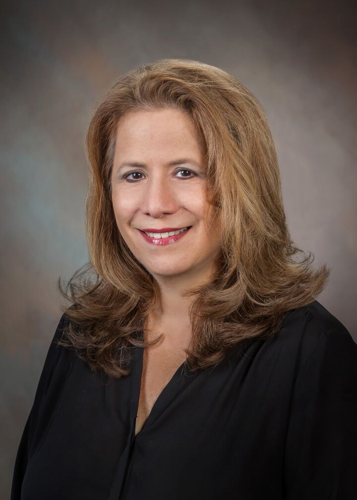 Kim Chalmers,  in Gainesville, Thomas Group