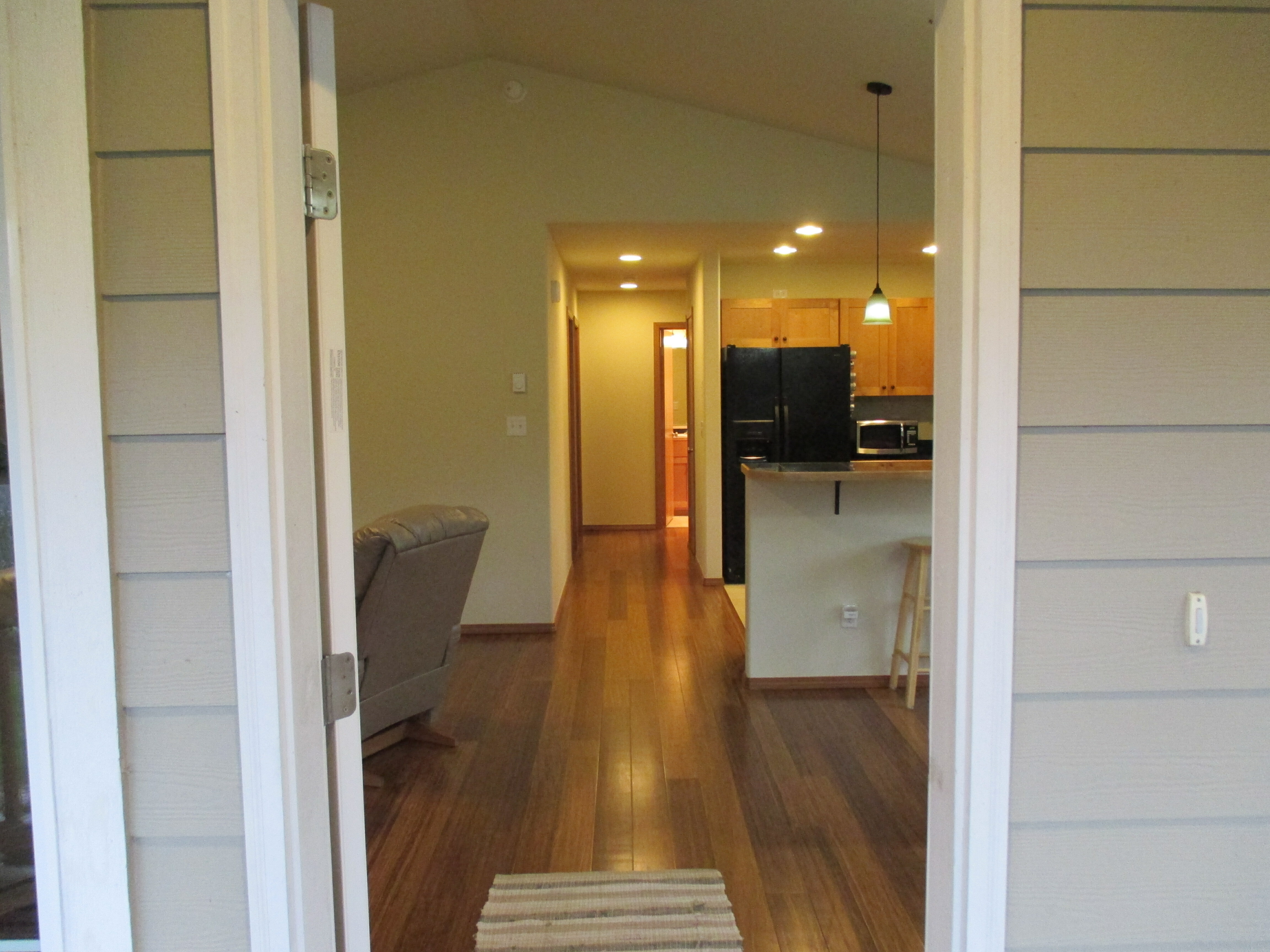 Property Photo: Entrance from the covered porch. 169 N Narwhal Lp NW  WA 98569 