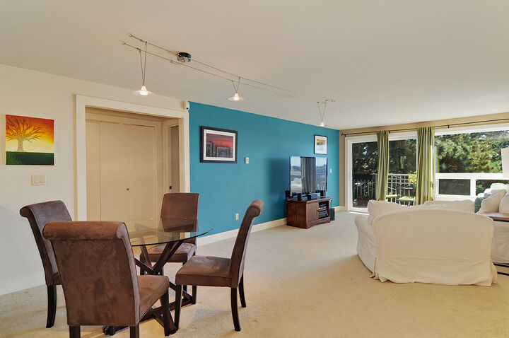 Property Photo: Living room, dining room, kitchen 121 N 46th St 301 WA 98103