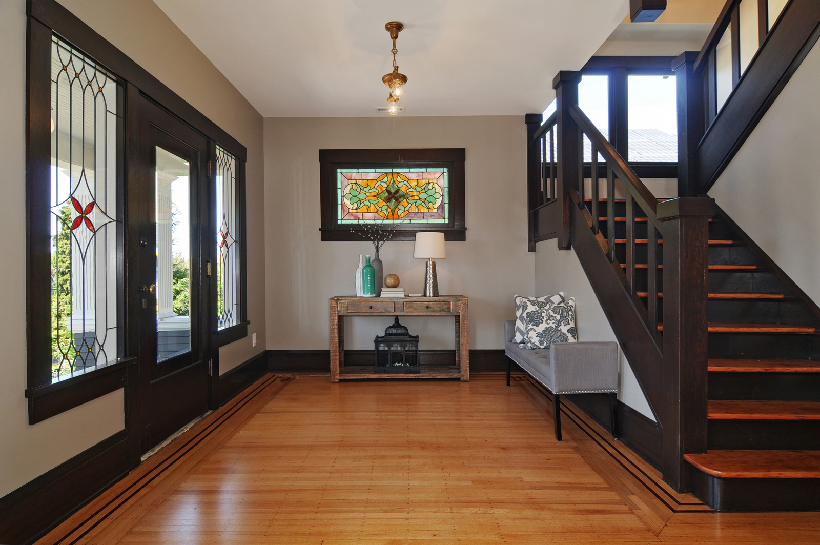 Property Photo: Foyer, living room, dining room, powder room 1712 3rd Ave N  WA 98109 